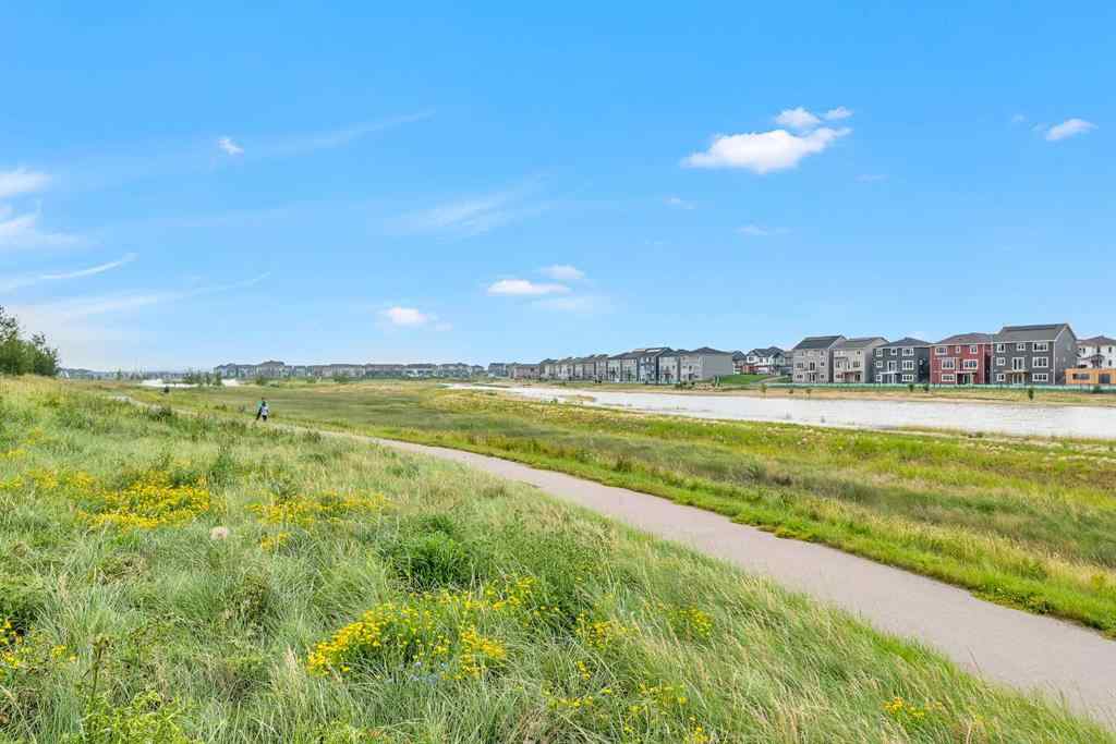 MLS® A2242476 - 311 Lucas Way NW in Livingston Calgary, Residential