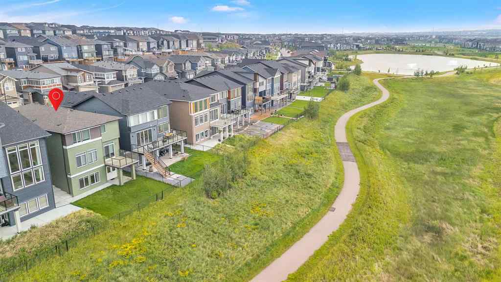 MLS® A2242476 - 311 Lucas Way NW in Livingston Calgary, Residential