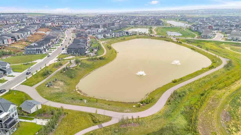 MLS® A2242476 - 311 Lucas Way NW in Livingston Calgary, Residential