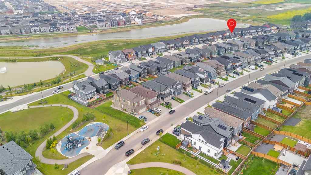 MLS® A2242476 - 311 Lucas Way NW in Livingston Calgary, Residential