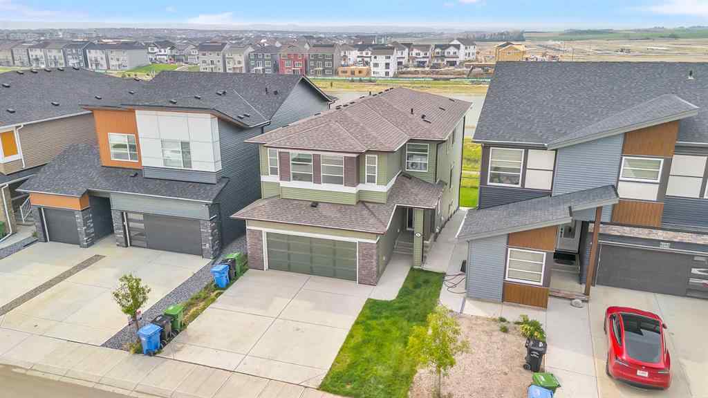 MLS® A2242476 - 311 Lucas Way NW in Livingston Calgary, Residential