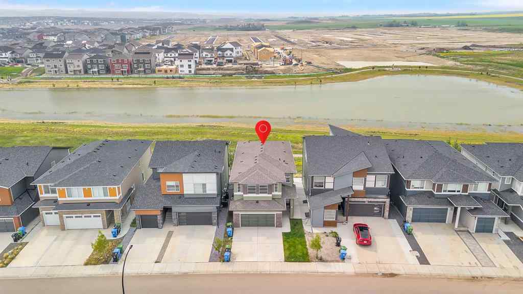 MLS® A2242476 - 311 Lucas Way NW in Livingston Calgary, Residential
