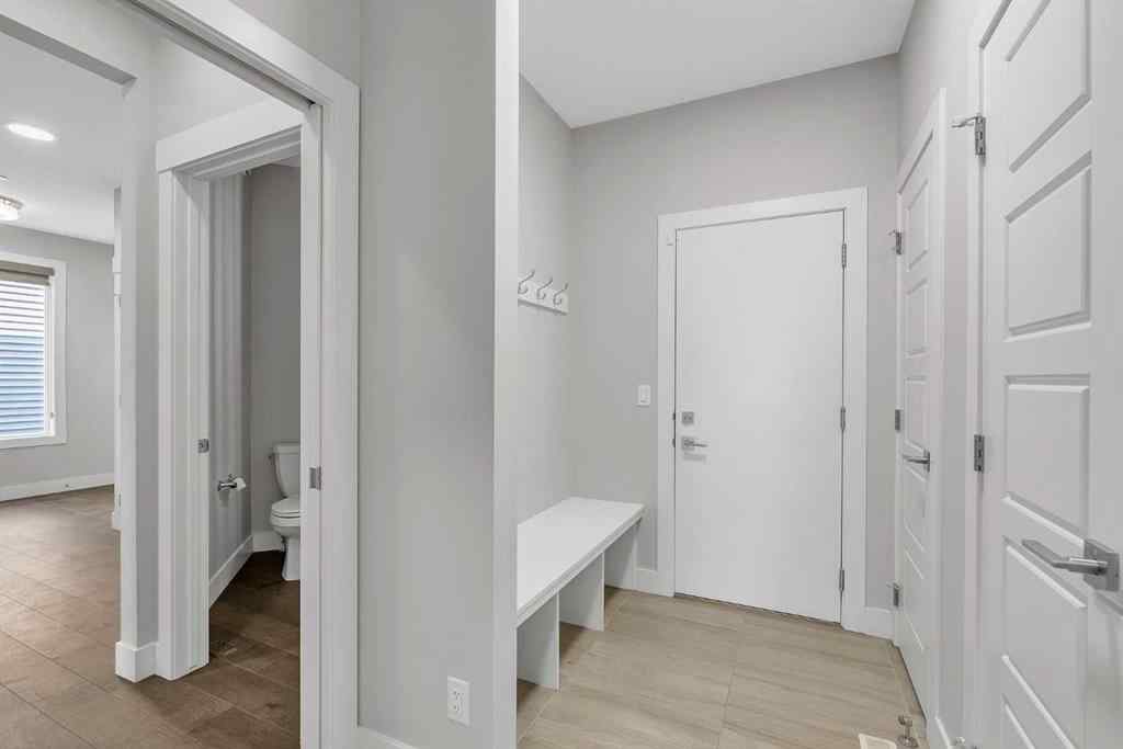 MLS® A2242476 - 311 Lucas Way NW in Livingston Calgary, Residential