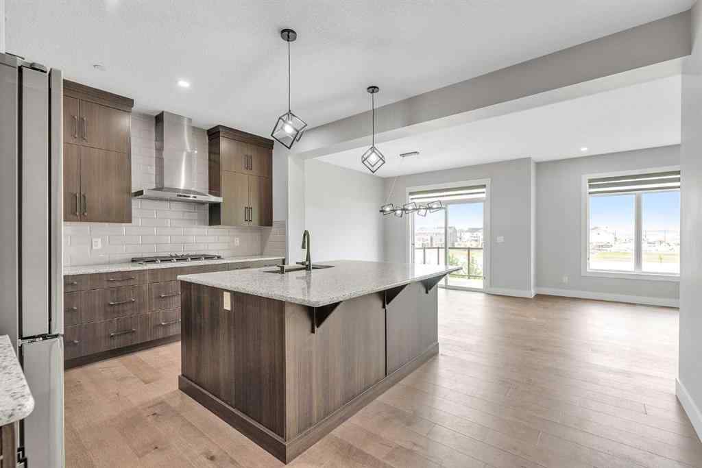 MLS® A2242476 - 311 Lucas Way NW in Livingston Calgary, Residential