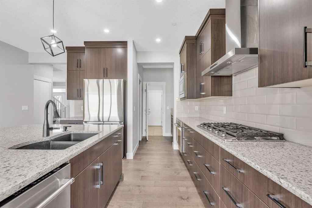 MLS® A2242476 - 311 Lucas Way NW in Livingston Calgary, Residential