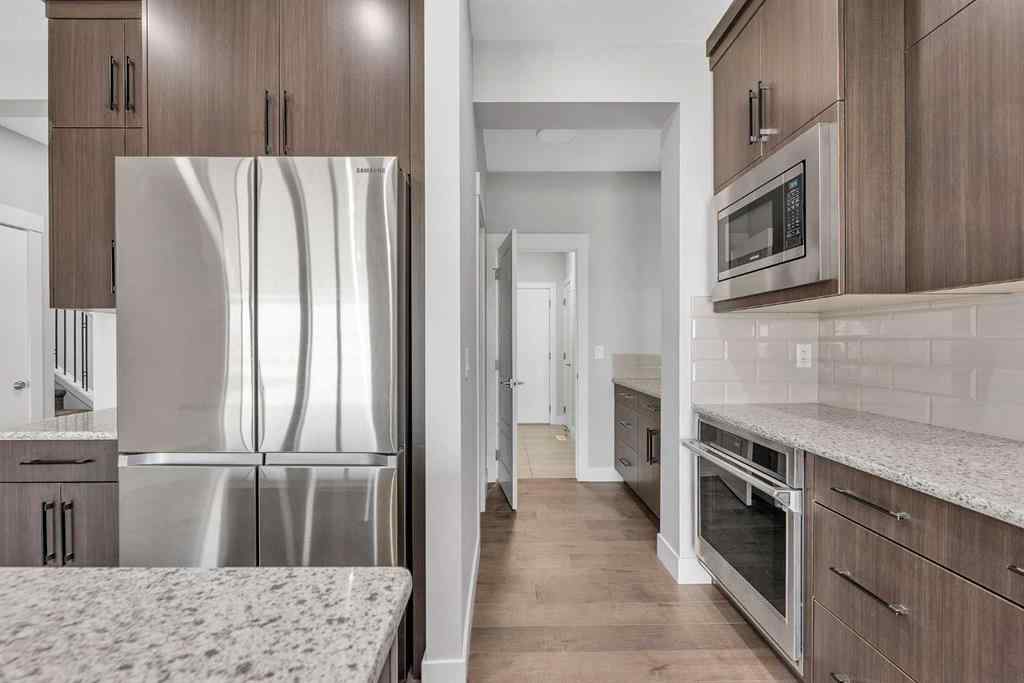 MLS® A2242476 - 311 Lucas Way NW in Livingston Calgary, Residential