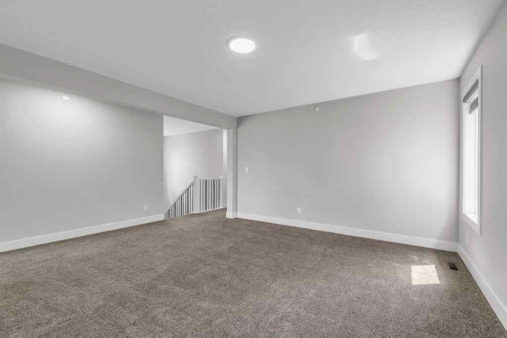 MLS® A2242476 - 311 Lucas Way NW in Livingston Calgary, Residential