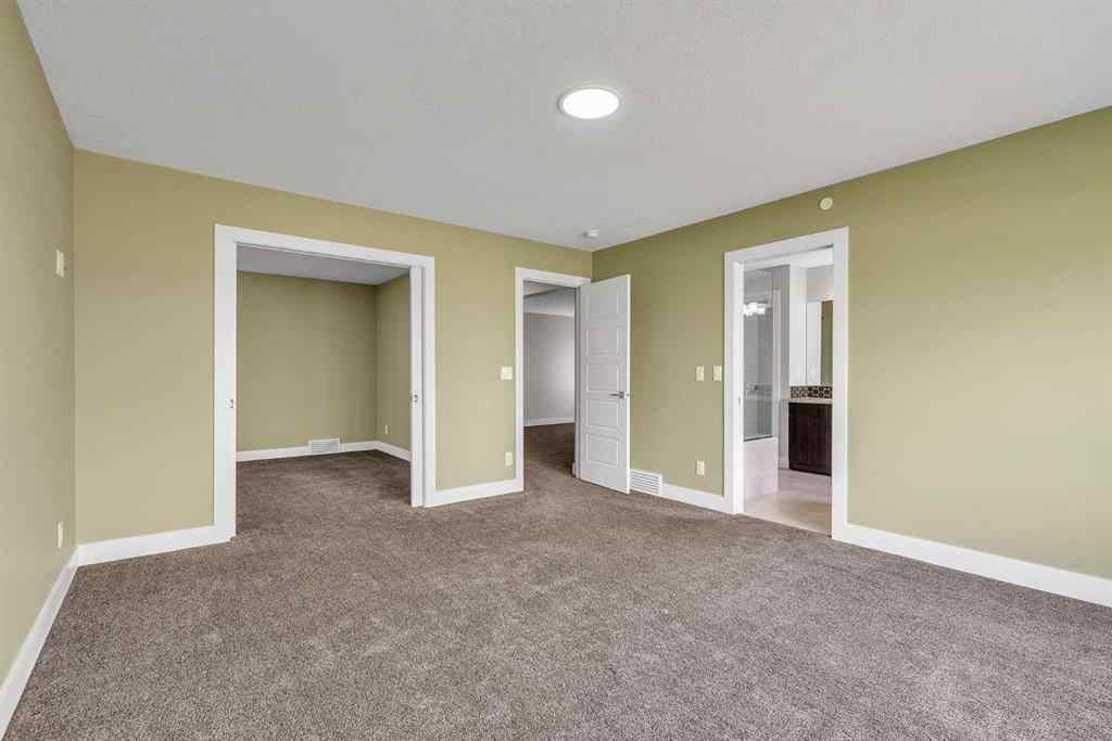 MLS® A2242476 - 311 Lucas Way NW in Livingston Calgary, Residential