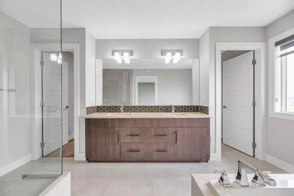MLS® A2242476 - 311 Lucas Way NW in Livingston Calgary, Residential