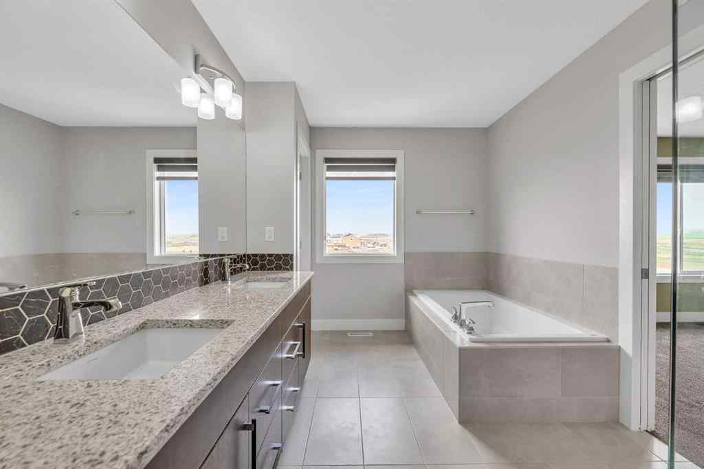 MLS® A2242476 - 311 Lucas Way NW in Livingston Calgary, Residential