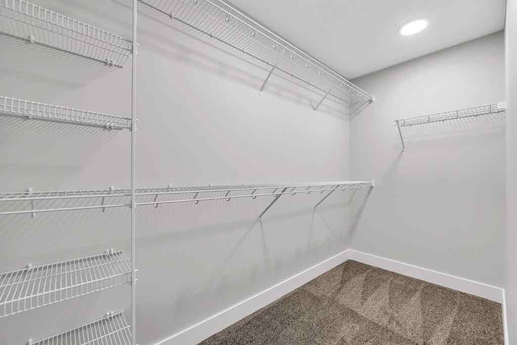 MLS® A2242476 - 311 Lucas Way NW in Livingston Calgary, Residential