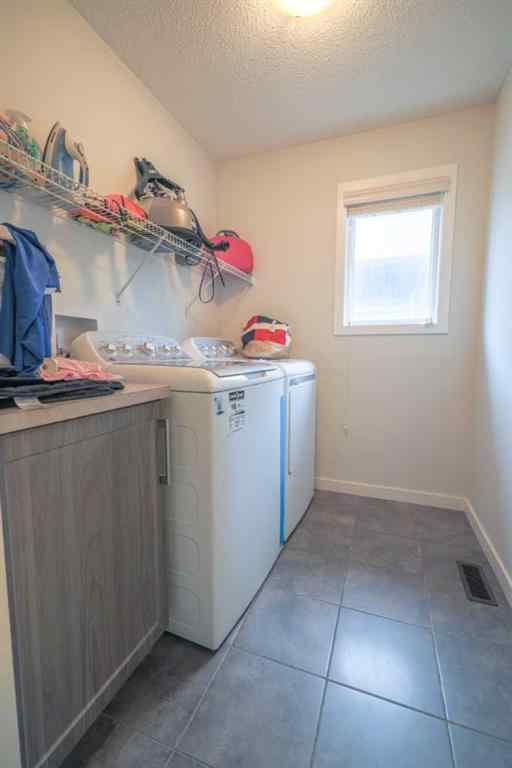 MLS® A2242522 - 385 Kings Heights Drive SE in Kings Heights Airdrie, Residential