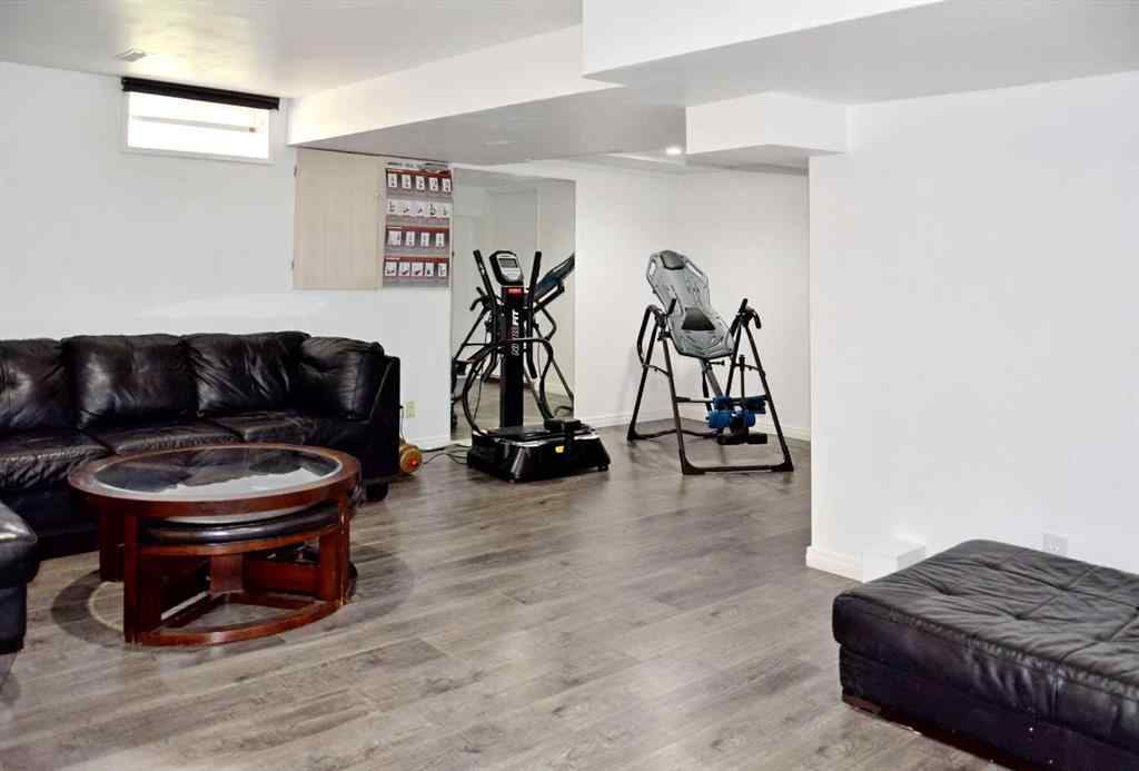 MLS® A2242528 - 59 Woodmont Way SW in Woodbine Calgary, Residential
