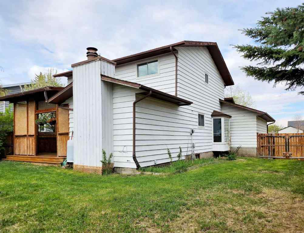 MLS® A2242528 - 59 Woodmont Way SW in Woodbine Calgary, Residential