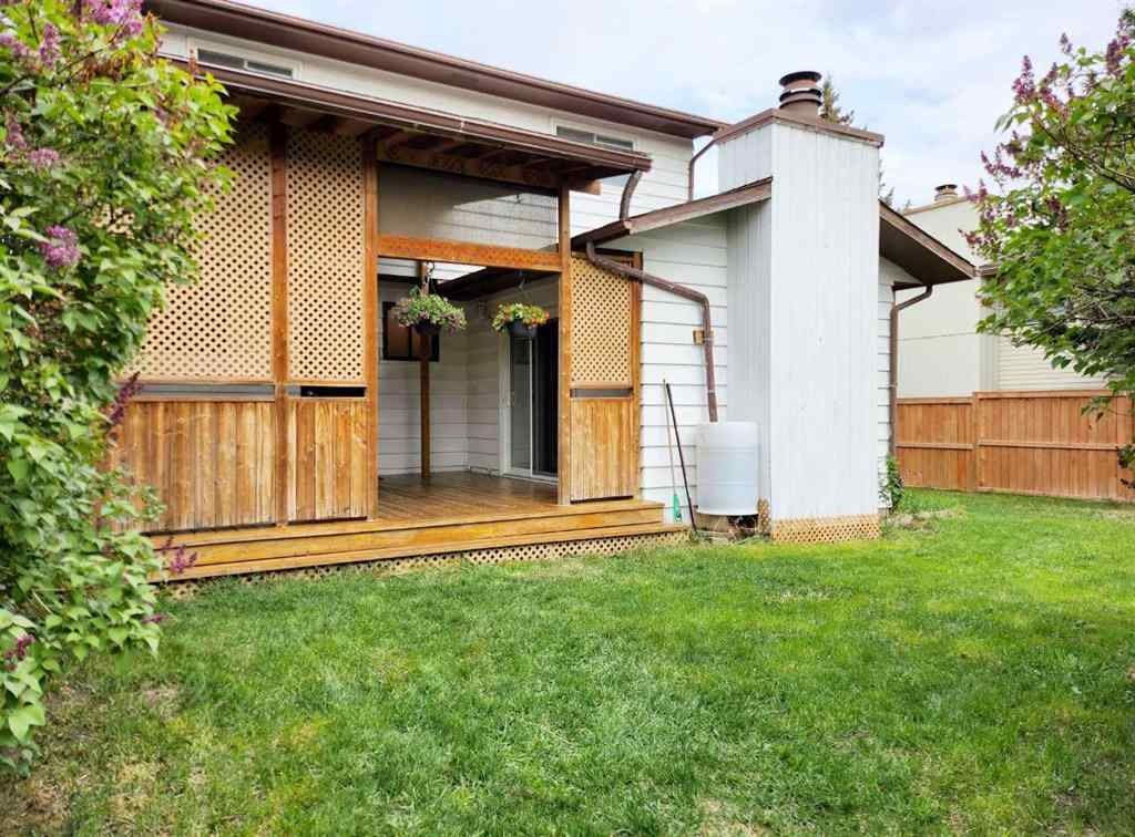 MLS® A2242528 - 59 Woodmont Way SW in Woodbine Calgary, Residential