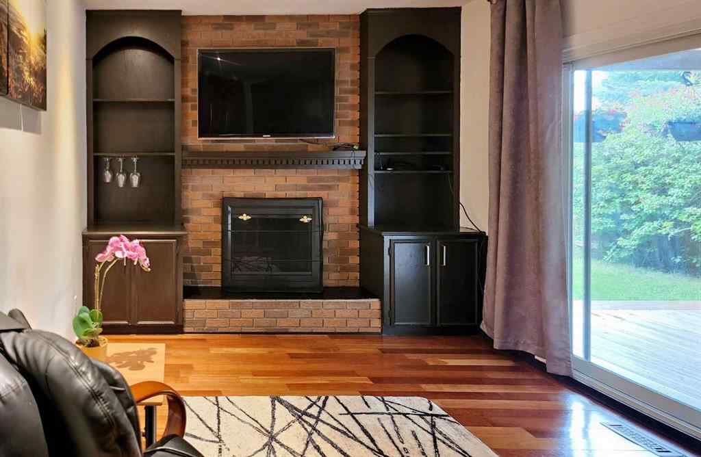 MLS® A2242528 - 59 Woodmont Way SW in Woodbine Calgary, Residential