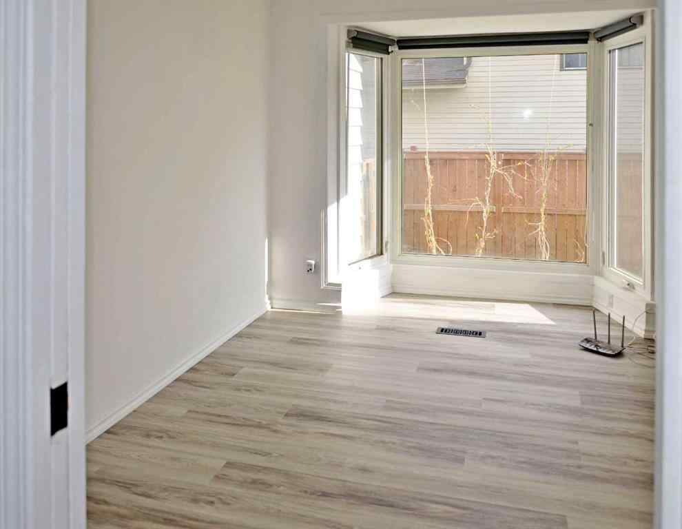 MLS® A2242528 - 59 Woodmont Way SW in Woodbine Calgary, Residential