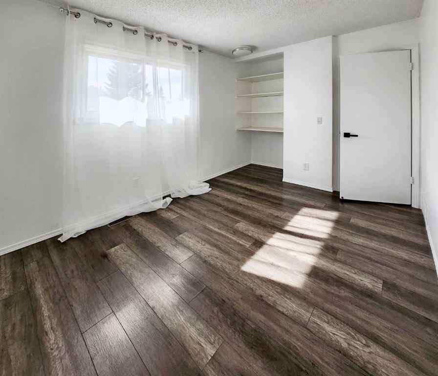 MLS® A2242528 - 59 Woodmont Way SW in Woodbine Calgary, Residential