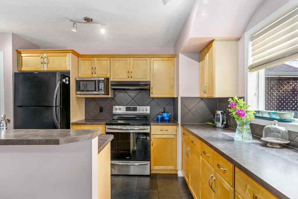 MLS® A2242546 - 96 Everridge Way SW in Evergreen Calgary, Residential