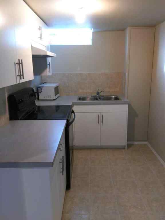 MLS® A2242549 - 3715 14 Street NW in Collingwood Calgary, Multi-Family