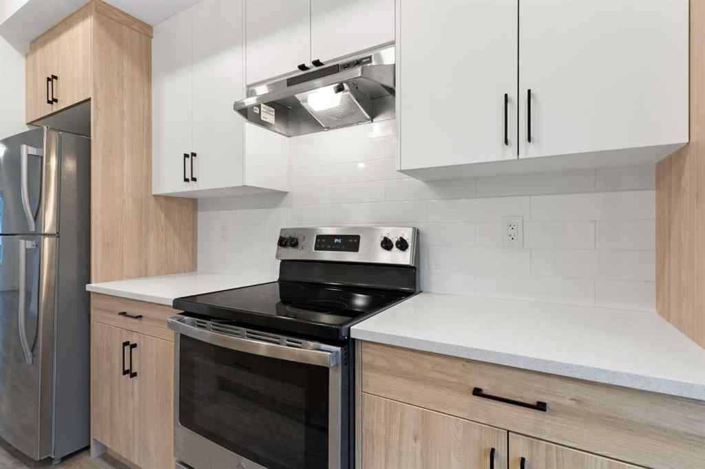 MLS® A2242550 - Unit #103 24 Rivercrest Drive  in Rivercrest Cochrane, Residential