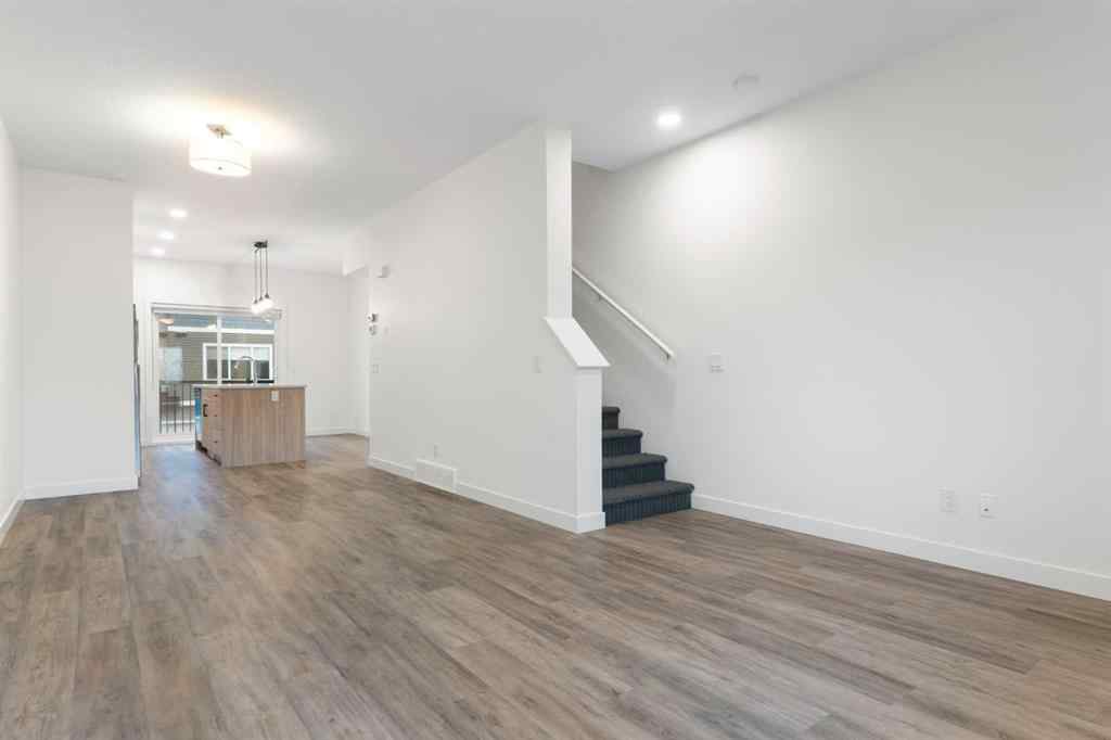 MLS® A2242550 - Unit #103 24 Rivercrest Drive  in Rivercrest Cochrane, Residential