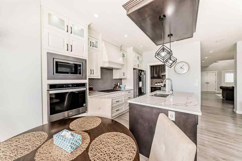 MLS® A2242562 - 235 Savanna Way NE in Saddle Ridge Calgary, Residential