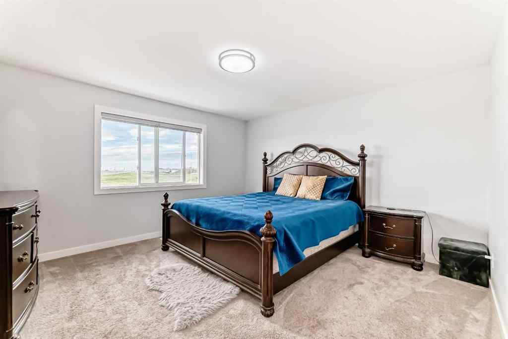 MLS® A2242562 - 235 Savanna Way NE in Saddle Ridge Calgary, Residential