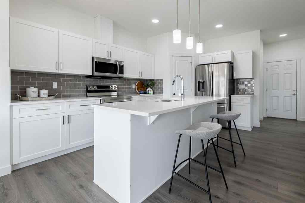 MLS® A2242569 - 55 Heritage Manor  in Heritage Hills Cochrane, Residential