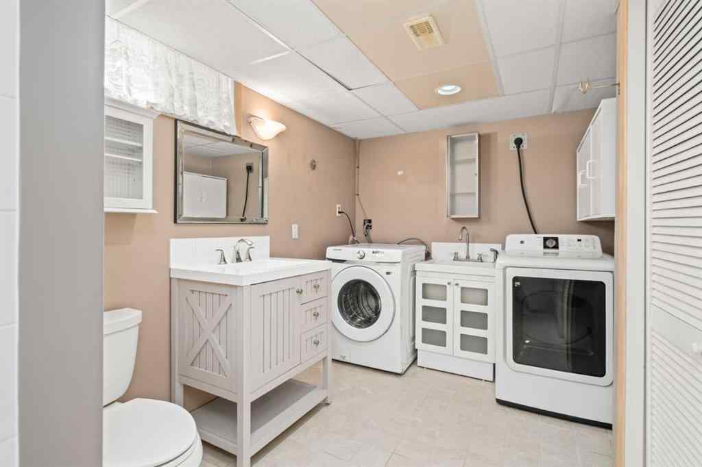 MLS® A2242588 - 811 Seattle Drive SW in Southwood Calgary, Residential