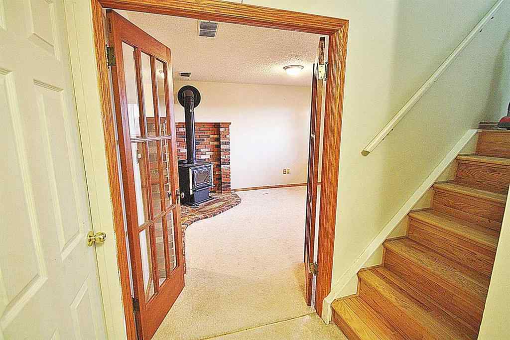 MLS® A2242590 - 203 Falwood Way NE in Falconridge Calgary, Residential