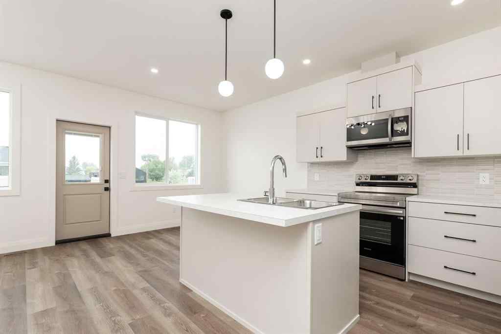 MLS® A2242597 - 306 S 50 W   in NONE Raymond, Residential