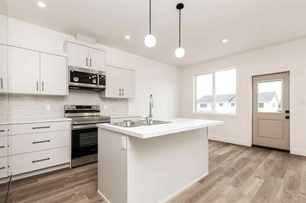 MLS® A2242611 - 308 S 50 W   in NONE Raymond, Residential