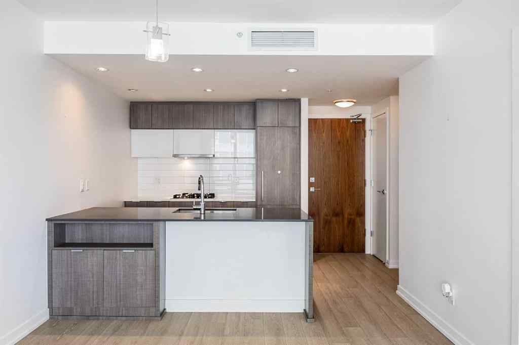 MLS® A2242635 - Unit #503 128 2 Street SW in Chinatown Calgary, Residential