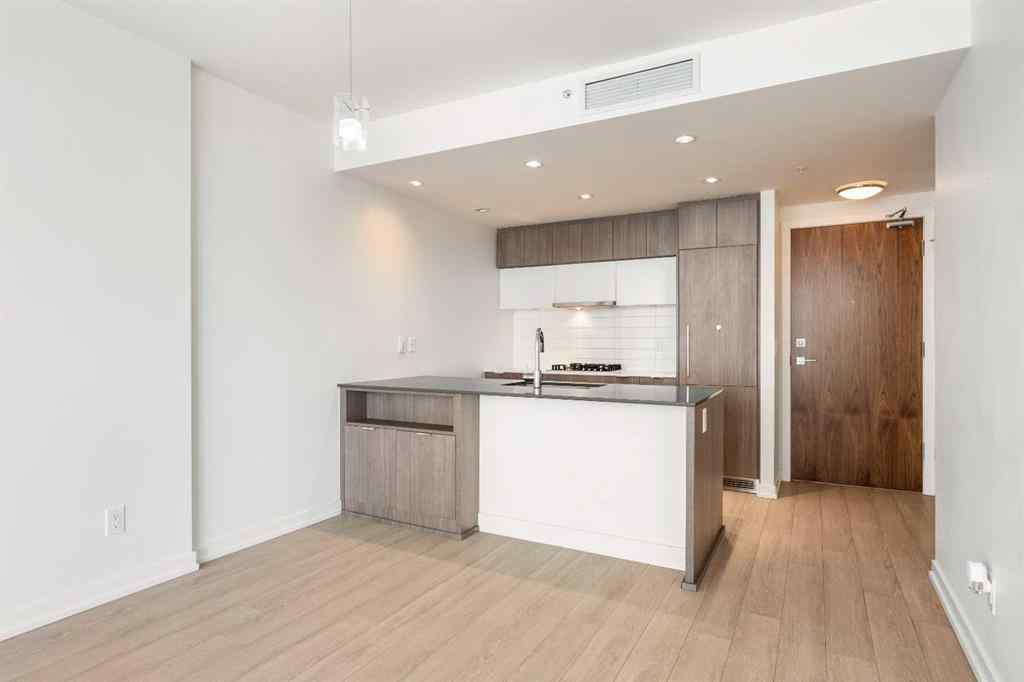 MLS® A2242635 - Unit #503 128 2 Street SW in Chinatown Calgary, Residential