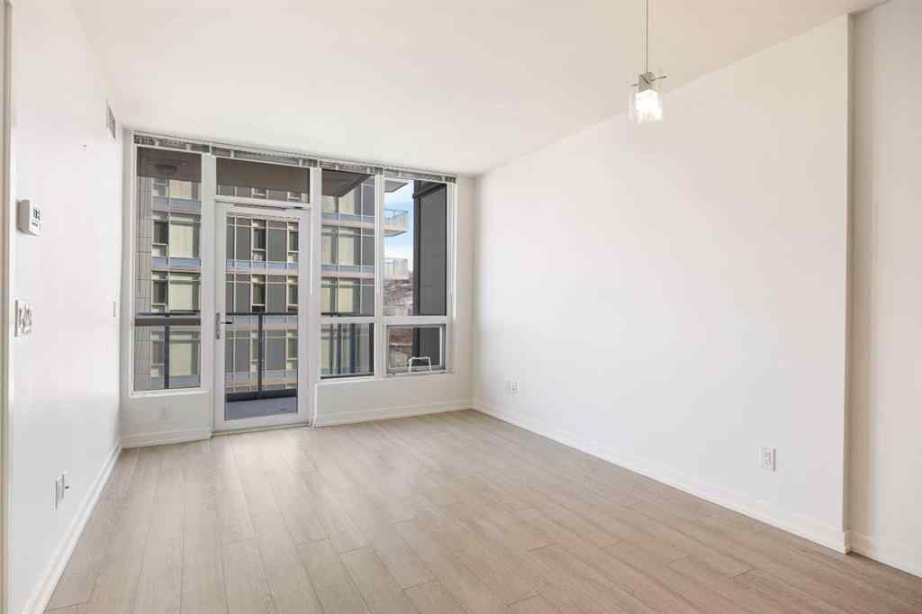 MLS® A2242635 - Unit #503 128 2 Street SW in Chinatown Calgary, Residential