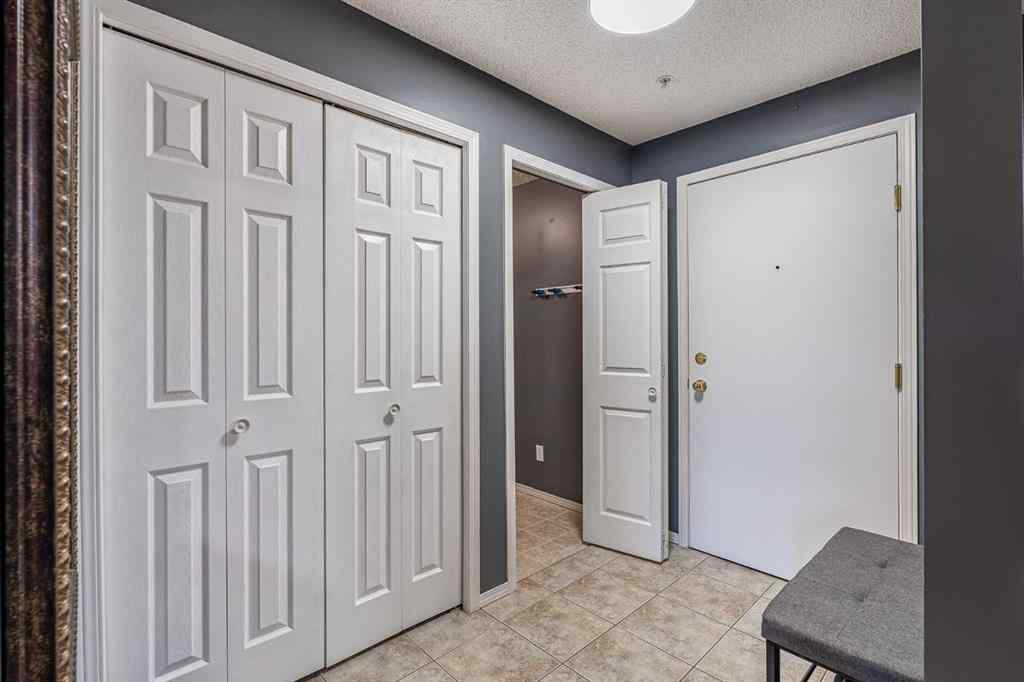 MLS® A2242672 - Unit #8213 304 Mackenzie Way SW in Downtown Airdrie, Residential