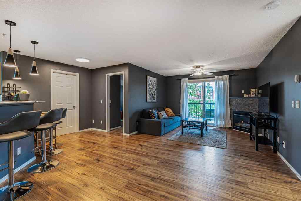 MLS® A2242672 - Unit #8213 304 Mackenzie Way SW in Downtown Airdrie, Residential