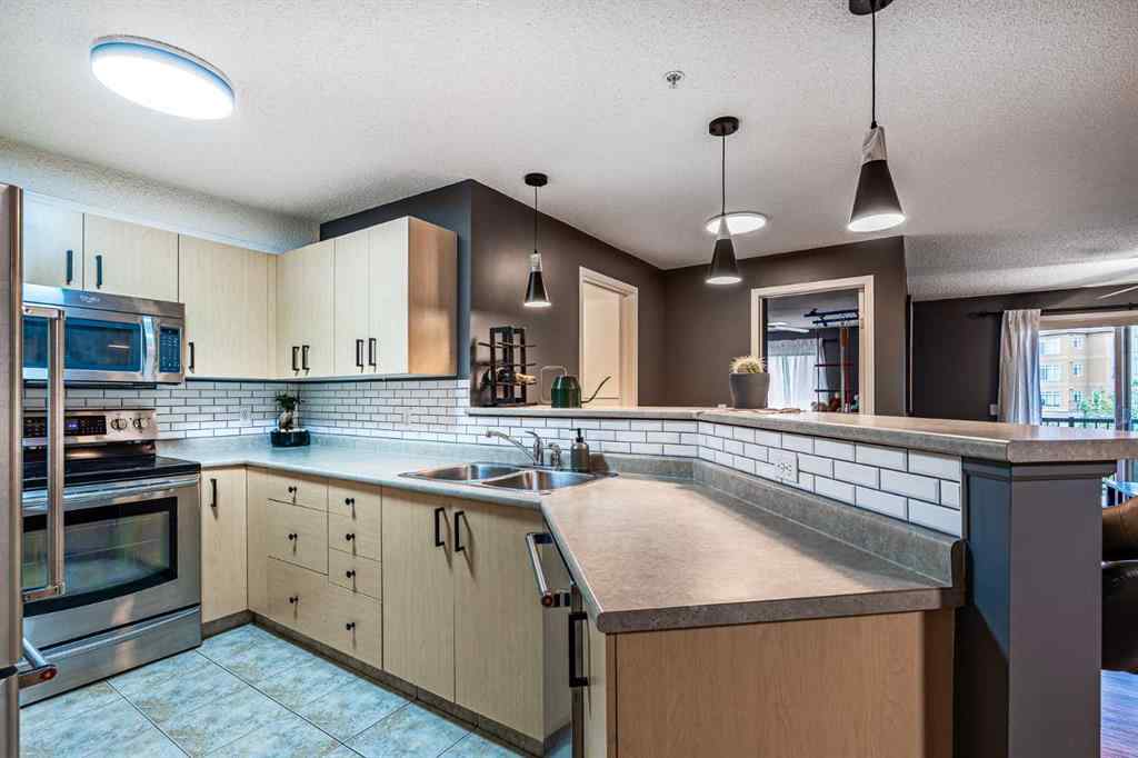 MLS® A2242672 - Unit #8213 304 Mackenzie Way SW in Downtown Airdrie, Residential