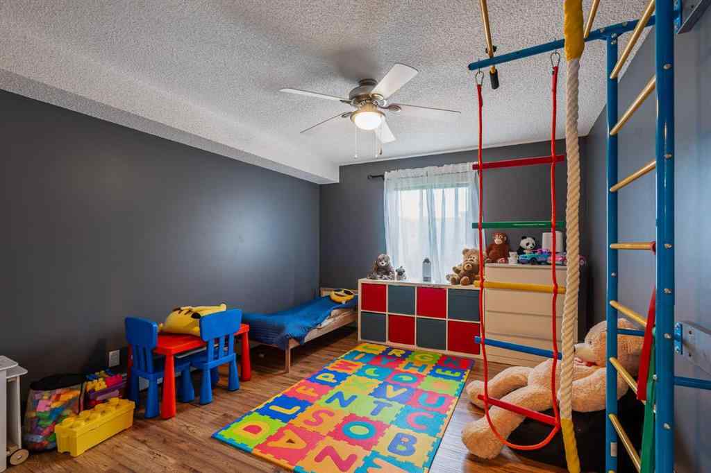 MLS® A2242672 - Unit #8213 304 Mackenzie Way SW in Downtown Airdrie, Residential