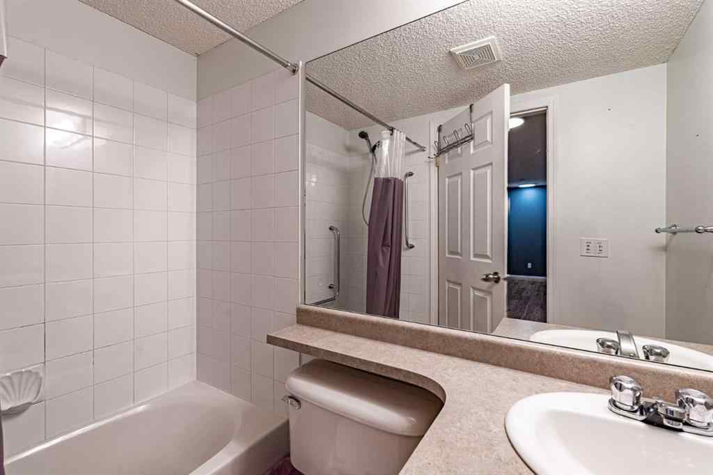 MLS® A2242672 - Unit #8213 304 Mackenzie Way SW in Downtown Airdrie, Residential