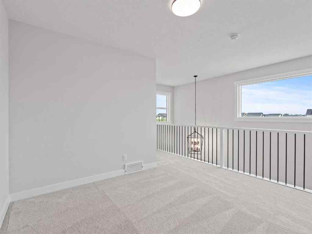 MLS® A2242673 - 307 Kinniburgh Loop  in Kinniburgh South Chestermere, Residential