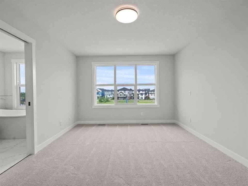 MLS® A2242673 - 307 Kinniburgh Loop  in Kinniburgh South Chestermere, Residential