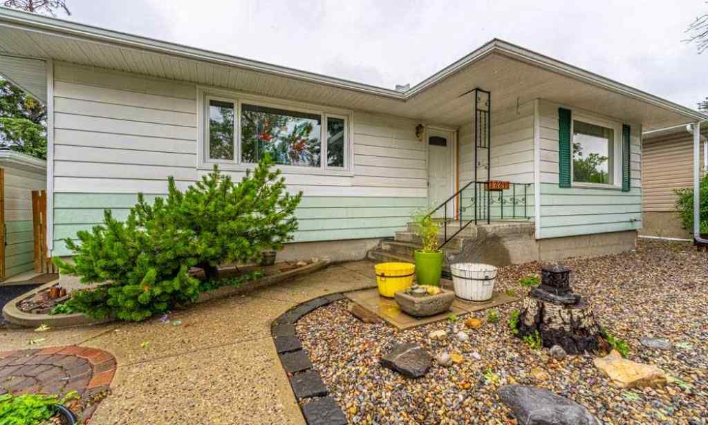 MLS® A2242702 - 2211 Halifax Crescent NW in Banff Trail Calgary, Residential