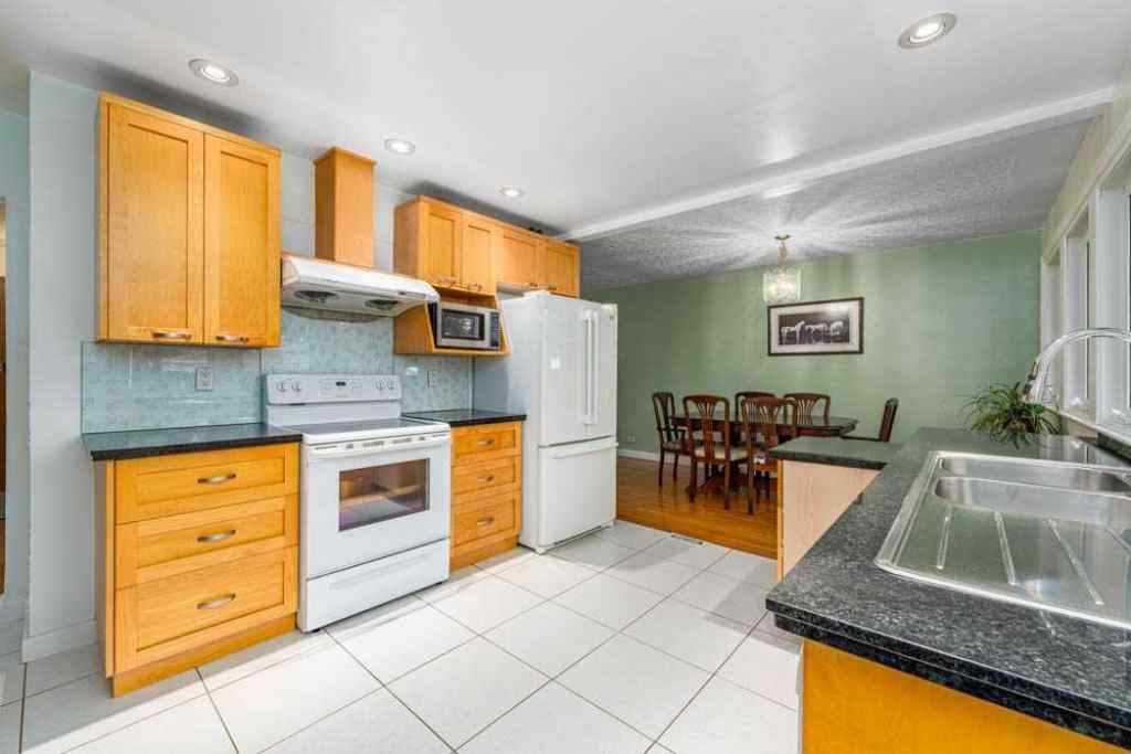 MLS® A2242702 - 2211 Halifax Crescent NW in Banff Trail Calgary, Residential