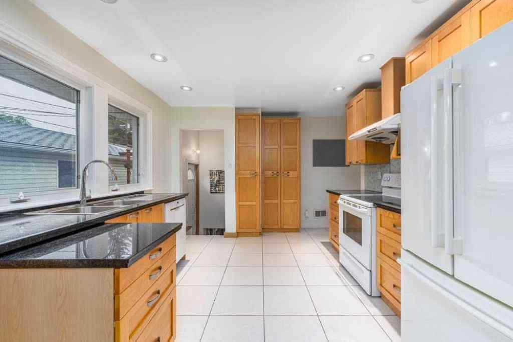 MLS® A2242702 - 2211 Halifax Crescent NW in Banff Trail Calgary, Residential