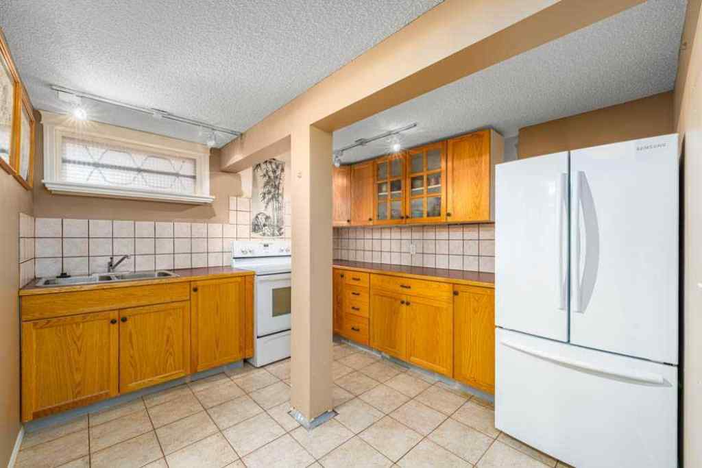 MLS® A2242702 - 2211 Halifax Crescent NW in Banff Trail Calgary, Residential