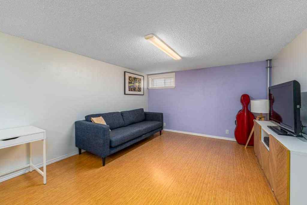 MLS® A2242702 - 2211 Halifax Crescent NW in Banff Trail Calgary, Residential
