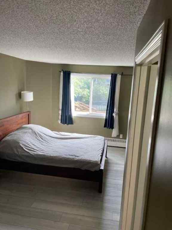 MLS® A2242724 - Unit #102 110 20 Avenue NE in Tuxedo Park Calgary, Residential