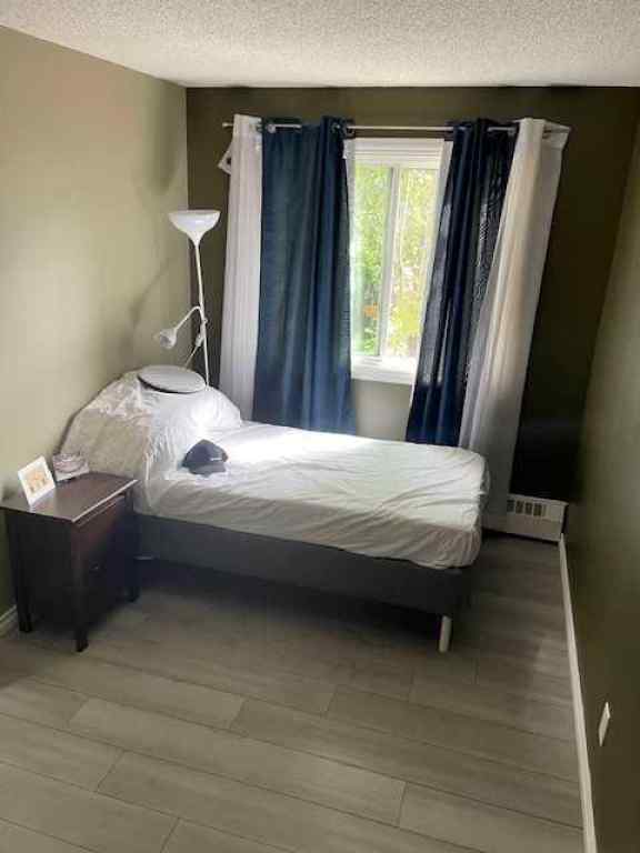 MLS® A2242724 - Unit #102 110 20 Avenue NE in Tuxedo Park Calgary, Residential